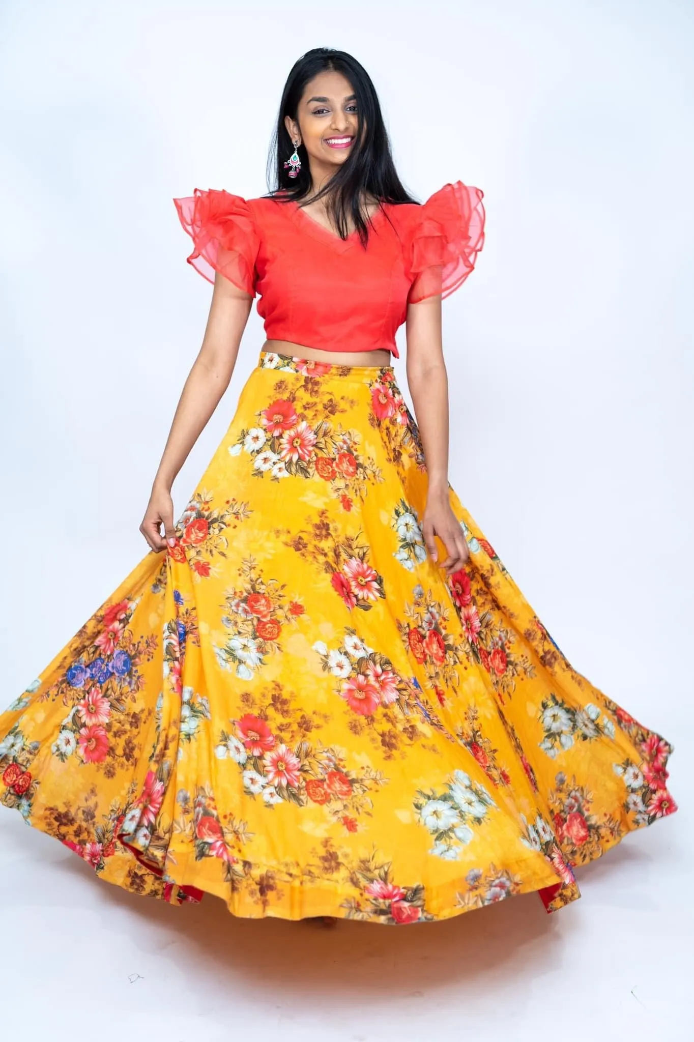 Orange Frill blouse With Mustard yellow Floral Lehenga
